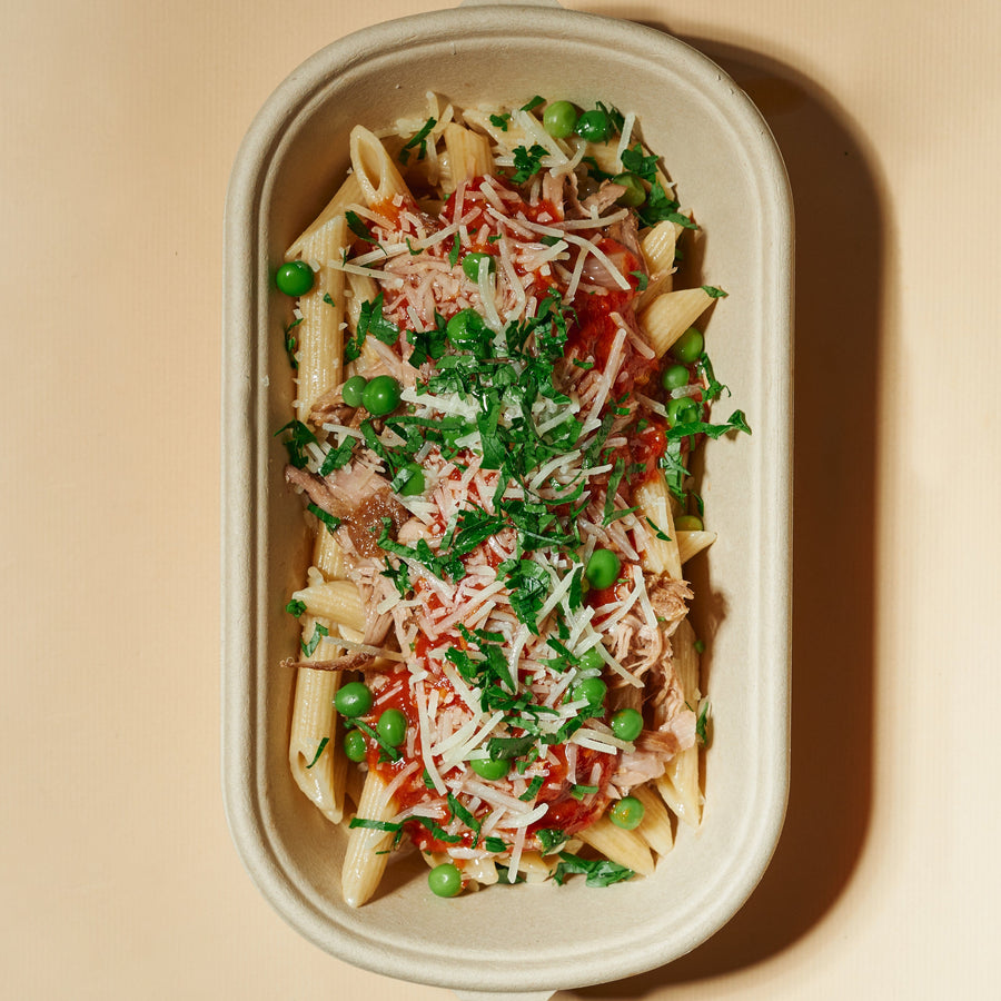 Plant-Based Pork Strips Ragu with Peas, Parmesan & Whole Wheat Penne