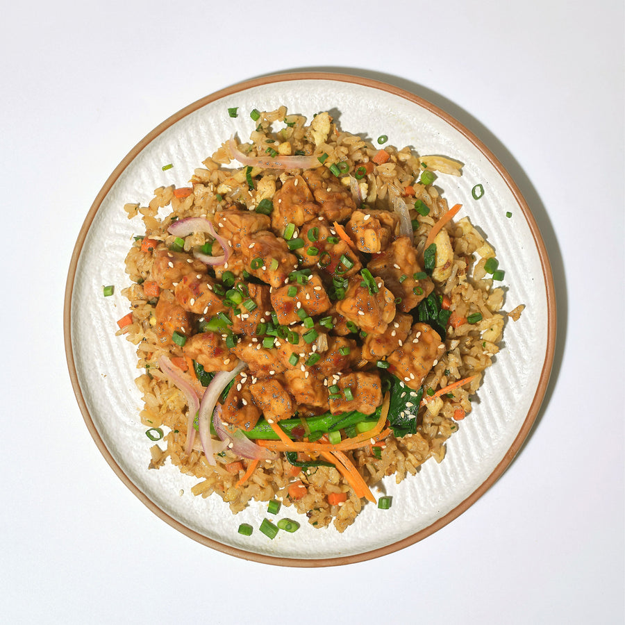 Southeast Asian Chili Tempeh with Baby Choi Sum, Onion & Nasi Goreng