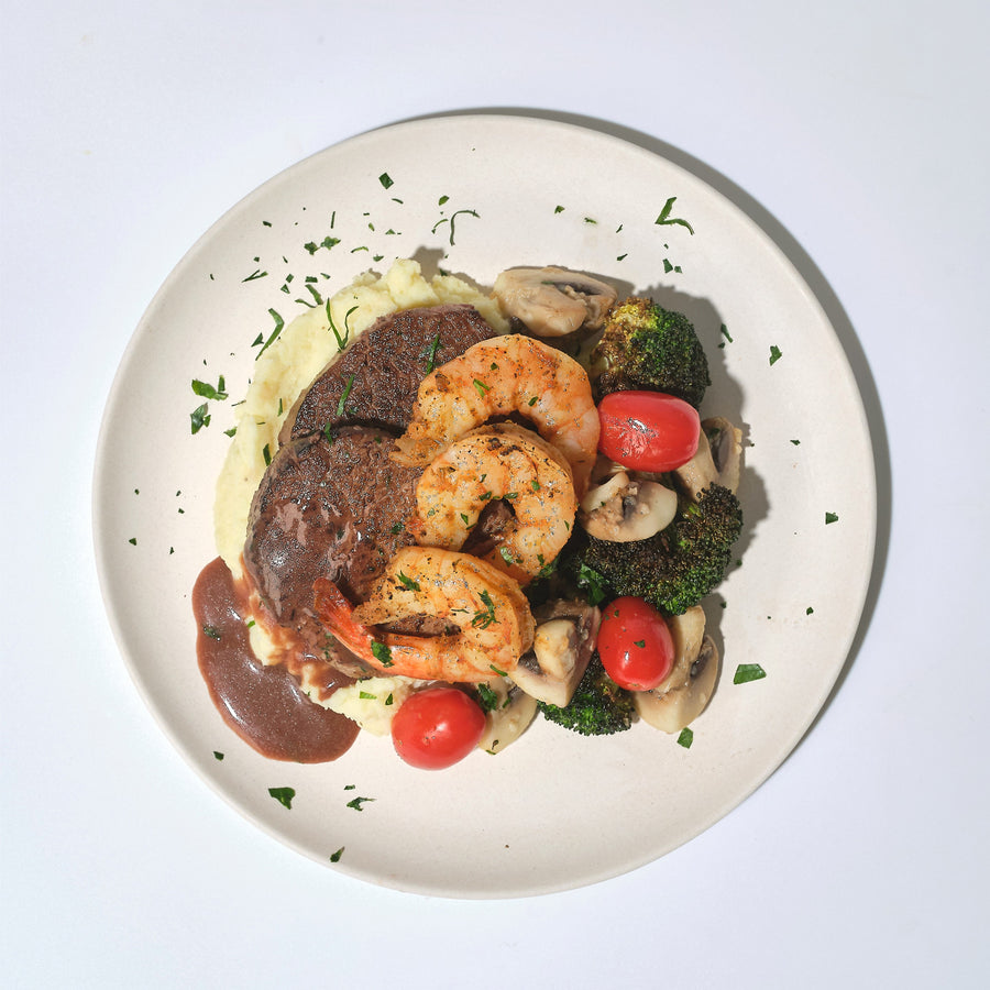 Surf & Turf with Beef Fillet Mignon, Cajun Shrimp, Charred Broccoli, Mushroom, Cherry Tomato, Bordelaise Sauce & Mashed Potato