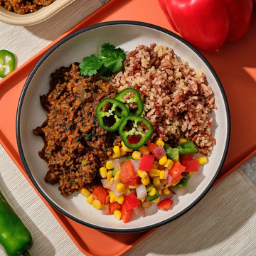 Pasture Fed Beef Chilli with Charred Corn, Roasted Peppers, Tomatoes, Cheddar Cheese & Steamed Thai Red Rice & Quinoa