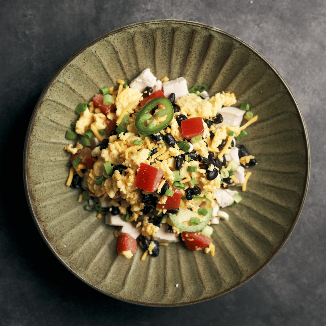 Southwest High Protein Scrambled Eggs with Tomatoes, Black Beans & Plant-Based Chicken