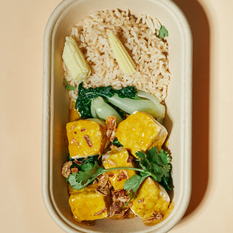 Tempeh Light Coconut Yellow Curry with Lime Leaf, Fried Shallots, Steamed Greens, Baby Corn & Steamed Thai Red Rice