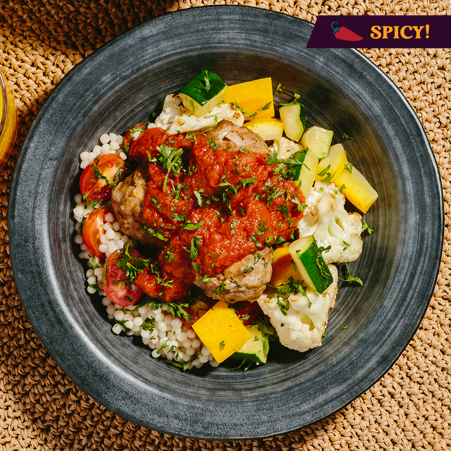 Plant-Based Meatballs with Spicy Low Fat Tomato Sauce, Harissa Cauliflower, Zucchini & Couscous