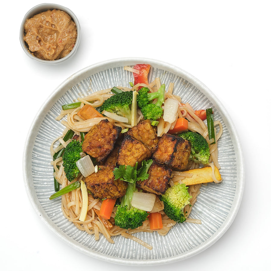 Satay Marinated Tempeh with Steamed Broccoli, Satay Sauce & Pad Thai