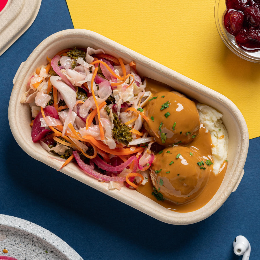 Swedish Plant-Based Pork Meatballs with Braised Cabbage, Baby Kai Lan, Lingonberry Compote & Mashed Potatoes