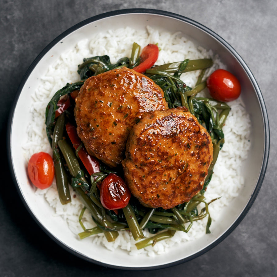 Thai Style Plant-Based Fish Cake with Sauteed Spinach, Nuoc Cham & Coconut Rice