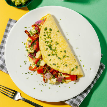 Brie Omelette with Roasted Peppers, Tomato, Red Onion & Tarragon