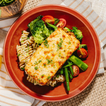 Oven Baked Garlic and Parmesan Salmon with Sauteed Green Market Vegetables & Lemon Fusilli
