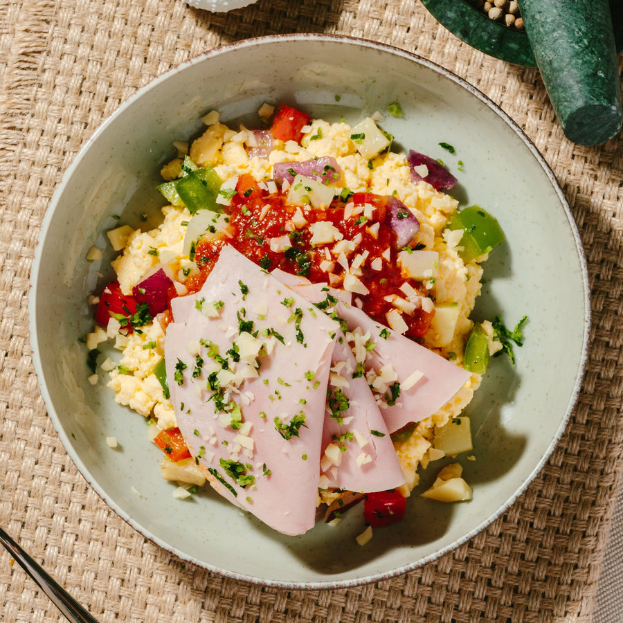 Country Breakfast Bowl with Roasted Potato Hash, Sauteed Lean Ham, Scrambled Eggs, Tomato Fondue & Cheddar Cheese
