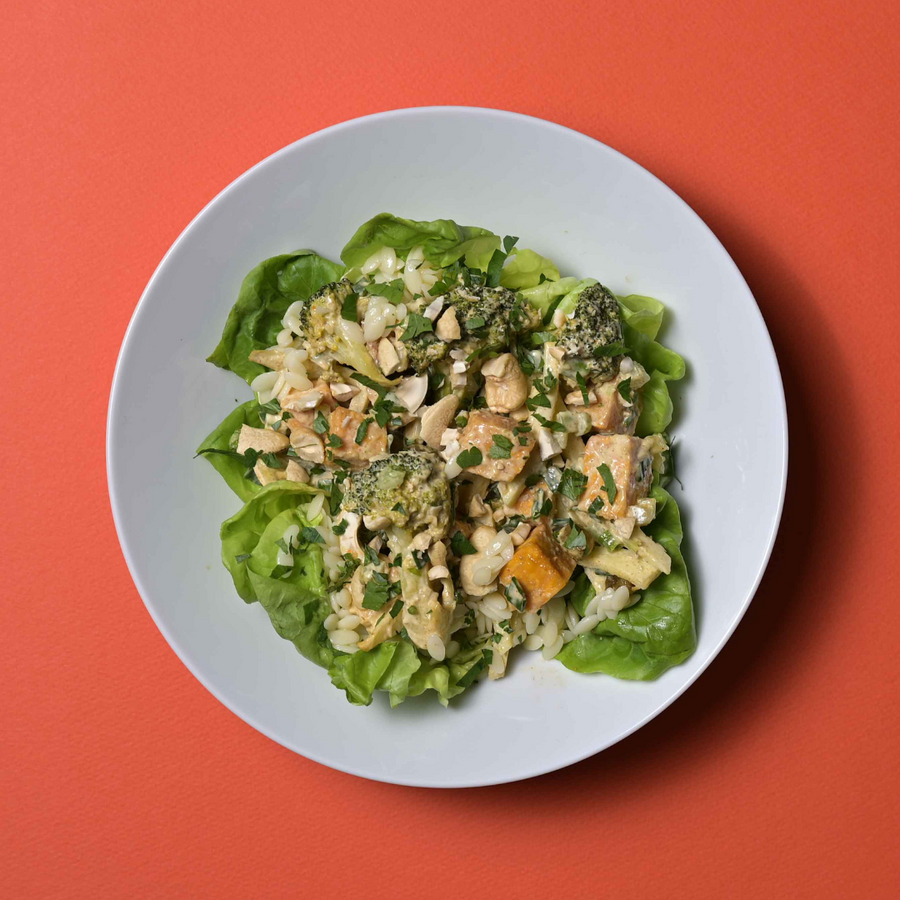 Curry Sweet Potato & Broccoli Salad with Butter Lettuce, Green Apples, Raisins, Cashews & Orzo