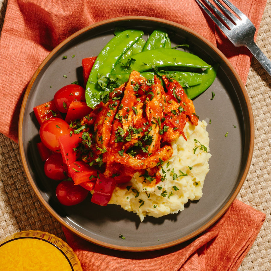 Plant Based Chicken Chasseur Stew with Roasted Mushrooms, Red Peppers , Snow Peas & Mashed Potatoes