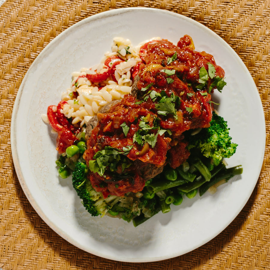 Mushroom & Plant Beef Meat Meatballs in Spanish Olive Tomato Sauce with Sauteed Greens & Orzo Salad